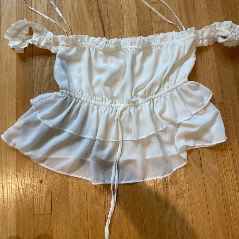 White ruffle off the shoulder top